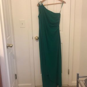 Evening one shoulder with brooch gown